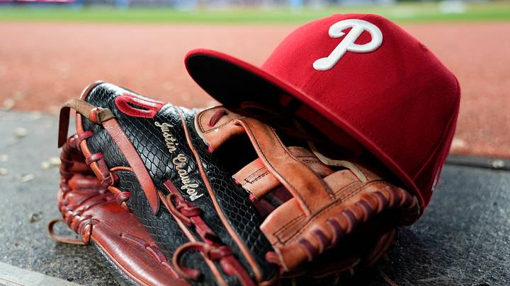 Jun 8, 2026; Toronto, Ontario, CAN; The glove and hat of Philadelphia Phillies center fielder Justin Crawford (2) in the dugout during a game against the Toronto Blue Jays at Rogers Centre. Mandatory Credit: John E. Sokolowski-Imagn Images