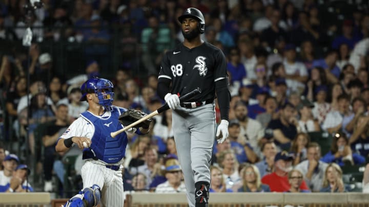 Jun 5, 2024; Chicago, Illinois, USA; Chicago White Sox center fielder Luis Robert Jr. (88) reacts after striking out against the Chicago Cubs during the ninth inning at Wrigley Field.