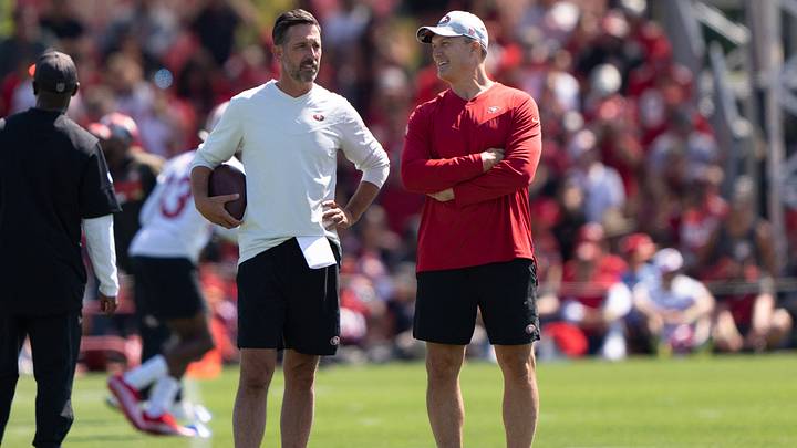Jul 27, 2022; Santa Clara, CA, USA; San Francisco 49ers head coach Kyle Shanahan (left) and general manager John Lynch watches the players during Training Camp at the SAP Performance Facility near Levi Stadium. Mandatory Credit: Stan Szeto-USA TODAY Sports