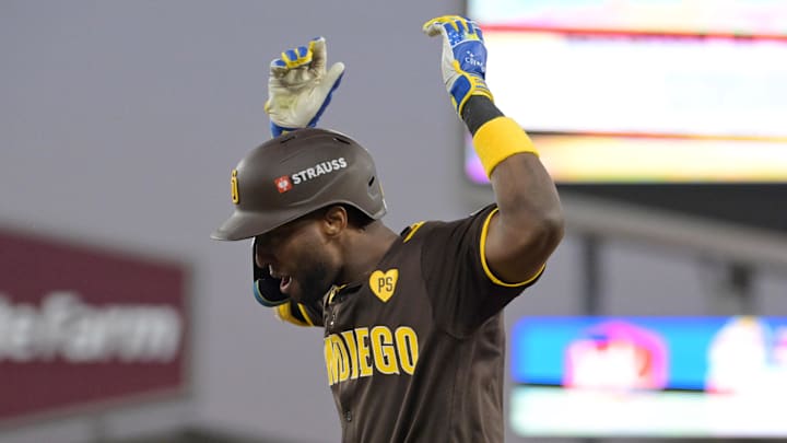 Oct 6, 2024; Los Angeles, California, USA; San Diego Padres outfielder Jurickson Profar (10) reacts at first base after bunting in the sixth inning against the Los Angeles Dodgers during game two of the NLDS for the 2024 MLB Playoffs at Dodger Stadium. Mandatory Credit: Jayne Kamin-Oncea-Imagn Images Oct 6, 2024; Los Angeles, California, USA; San Diego Padres outfielder Jurickson Profar (10) reacts at first base after bunting in the sixth inning against the Los Angeles Dodgers during game two of the NLDS for the 2024 MLB Playoffs at Dodger Stadium. Mandatory Credit: Jayne Kamin-Oncea-Imagn Images