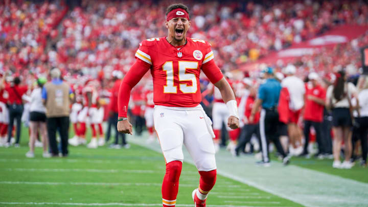 Aug 22, 2025; Kansas City, Missouri, USA; Kansas City Chiefs quarterback Patrick Mahomes (15) celebrates toward fans against the Chicago Bears during the first half of the game at GEHA Field at Arrowhead Stadium. Mandatory Credit: Denny Medley-Imagn Images