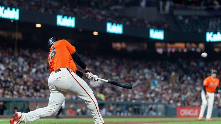 Sep 11, 2026; San Francisco, California, USA;  San Francisco Giants first baseman Rafael Devers (16) hits a grand slam during the fifth inning against the San Diego Padres at Oracle Park.  Mandatory Credit: Bob Kupbens-Imagn Images