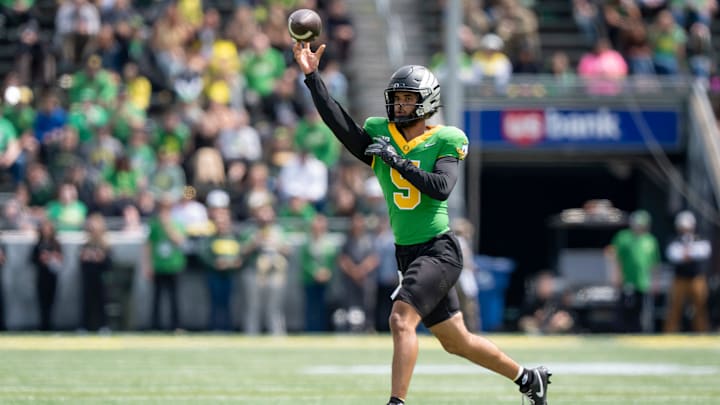 Fighting Ducks quarterback Dante Moore throws out a pass as the Fighting Ducks face off against Mighty Oregon in the Oregon Ducks spring game on April 26, 2025, at Autzen Stadium in Eugene.