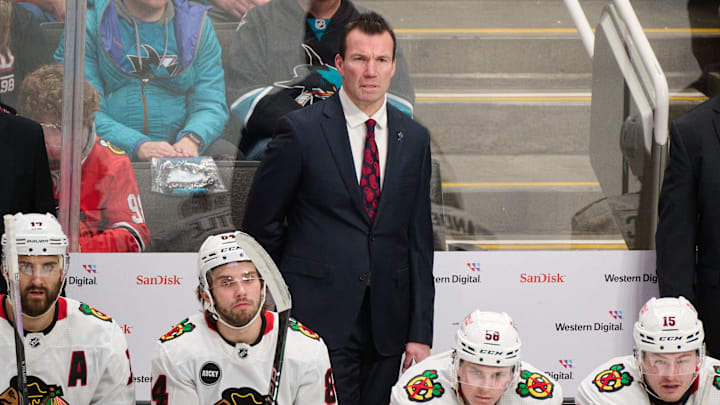 Chicago Blackhawks head coach Luke Richardson watches game play against the San Jose Sharks.