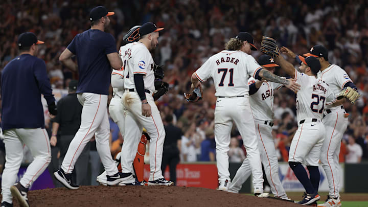 Sep 24, 2024; Houston, Texas, USA; Houston Astros relief pitcher Josh Hader (71) , catcher Yainer Diaz (21) third baseman Alex Bregman (2) and first baseman Victor Caratini (17) celebrate defeating the Seattle Mariners and winning the American League West at Minute Maid Park. Sep 24, 2024; Houston, Texas, USA; Houston Astros relief pitcher Josh Hader (71) , catcher Yainer Diaz (21) third baseman Alex Bregman (2) and first baseman Victor Caratini (17) celebrate defeating the Seattle Mariners and winning the American League West at Minute Maid Park.