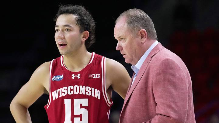 Wisconsin head coach Greg Gard talks with guard Owen Foxwell (15) during the second half of their preseason game Thursday, Oct. 15, 2026 at the Resch Center in Green Bay, Wisconsin. Wisconsin beat UW-Green Bay 96-77.
