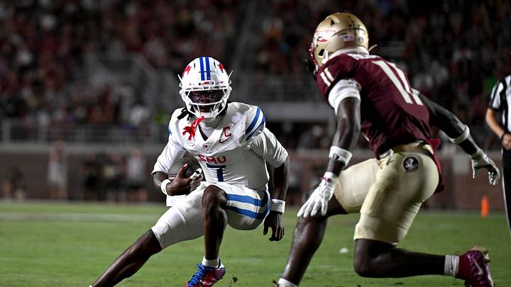 Sep 7, 2026; Tallahassee, Florida, USA; Southern Methodist Mustangs quarterback Kevin Jennings (7) runs against Florida State Seminoles defensive back CJ Richard Jr. (11) during the second half at Doak S. Campbell Stadium. Mandatory Credit: Melina Myers-Imagn Images Sep 7, 2026; Tallahassee, Florida, USA; Southern Methodist Mustangs quarterback Kevin Jennings (7) runs against Florida State Seminoles defensive back CJ Richard Jr. (11) during the second half at Doak S. Campbell Stadium. Mandatory Credit: Melina Myers-Imagn Images