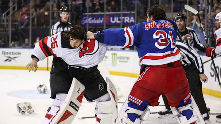 Mar 31, 2026; New York, New York, USA; New York Rangers goaltender Igor Shesterkin (31) and New Jersey Devils goaltender Jacob Markstrom (25) fight in the third period at Madison Square Garden. Mandatory Credit: Wendell Cruz-Imagn Images Mar 31, 2026; New York, New York, USA; New York Rangers goaltender Igor Shesterkin (31) and New Jersey Devils goaltender Jacob Markstrom (25) fight in the third period at Madison Square Garden. Mandatory Credit: Wendell Cruz-Imagn Images