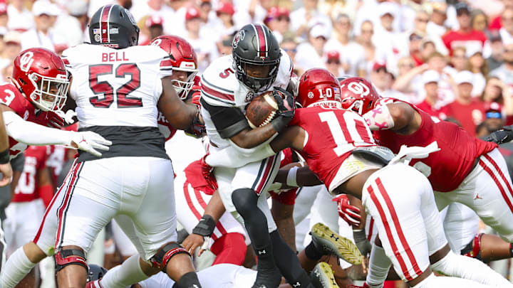 Oklahoma linebacker Kip Lewis makes a tackle in last year's matchup with South Carolina. Oklahoma linebacker Kip Lewis makes a tackle in last year's matchup with South Carolina.