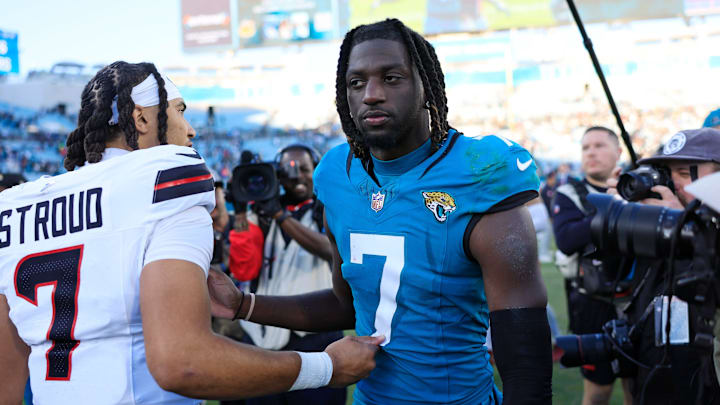Houston Texans quarterback C.J. Stroud (7), left, talks with Jacksonville Jaguars wide receiver Brian Thomas Jr. (7) after the game of an NFL football matchup Sunday, Dec. 1, 2024 at EverBank Stadium in Jacksonville, Fla. The Texans held off the Jaguars 23-20. [Corey Perrine/Florida Times-Union]