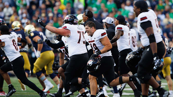 Northern Illinois celebrates after winning a NCAA college football game 16-14 against Notre Dame at Notre Dame Stadium on Saturday, Sept. 7, 2024, in South Bend.
