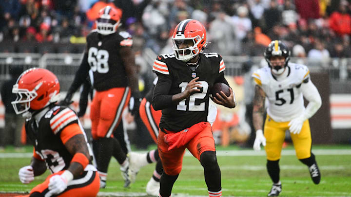 Dec 28, 2025; Cleveland, Ohio, USA; Cleveland Browns quarterback Shedeur Sanders (12) runs with the ball in the second quarter against the Pittsburgh Steelers at Huntington Bank Field. Mandatory Credit: Ken Blaze-Imagn Images