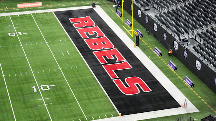 The UNLV Rebels logo in the end zone is seen before the Mountain West Championship between the Boise State Broncos and the UNLV Rebels at Allegiant Stadium. Mandatory Credit: Kirby Lee-Imagn Images