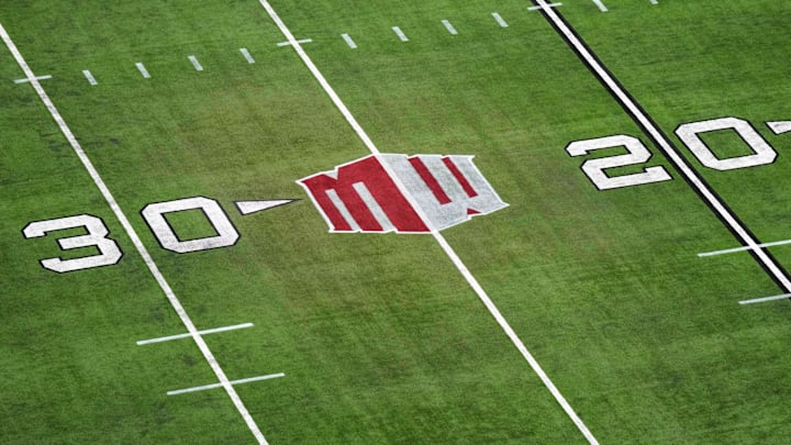 The Mountain West conference logo on the field at Allegiant Stadium. Mandatory Credit: Kirby Lee-Imagn Images The Mountain West conference logo on the field at Allegiant Stadium. Mandatory Credit: Kirby Lee-Imagn Images