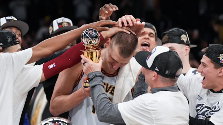 May 22, 2023; Los Angeles, California, USA; Denver Nuggets center Nikola Jokic (15) and head coach Michael Malone celebrate beating the Los Angeles Lakers in game four of the Western Conference Finals for the 2023 NBA playoffs at Crypto.com Arena. Mandatory Credit: Kirby Lee-Imagn Images May 22, 2023; Los Angeles, California, USA; Denver Nuggets center Nikola Jokic (15) and head coach Michael Malone celebrate beating the Los Angeles Lakers in game four of the Western Conference Finals for the 2023 NBA playoffs at Crypto.com Arena. Mandatory Credit: Kirby Lee-Imagn Images