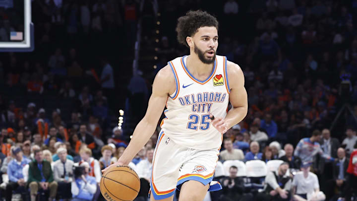 Dec 23, 2024; Oklahoma City, Oklahoma, USA; Oklahoma City Thunder guard Ajay Mitchell (25) dribbles the ball down the court against the Washington Wizards during the second half at Paycom Center. Mandatory Credit: Alonzo Adams-Imagn Images