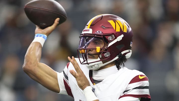 Jan 5, 2025; Arlington, Texas, USA; Washington Commanders quarterback Jayden Daniels (5) throws a pass against the Dallas Cowboys during the first quarter at AT&T Stadium. Mandatory Credit: Tim Heitman-Imagn Images Jan 5, 2025; Arlington, Texas, USA; Washington Commanders quarterback Jayden Daniels (5) throws a pass against the Dallas Cowboys during the first quarter at AT&T Stadium. Mandatory Credit: Tim Heitman-Imagn Images