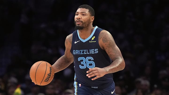 Dec 15, 2024; Los Angeles, California, USA; Memphis Grizzlies guard Marcus Smart (36) dribbles against the Los Angeles Lakers in the second half  at Crypto.com Arena. Mandatory Credit: Kirby Lee-Imagn Images