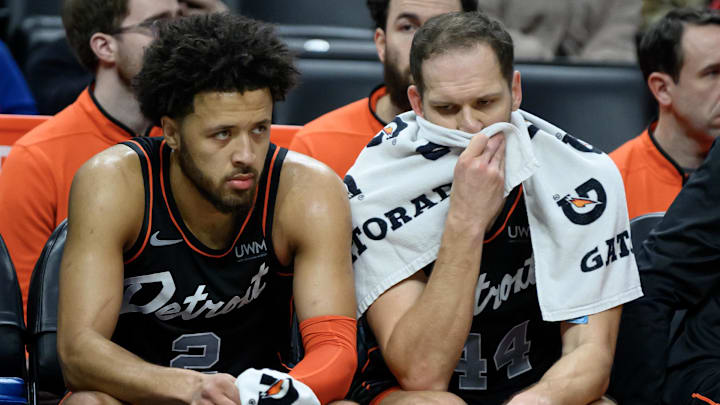 Jan 27, 2024; Detroit, Michigan, USA; Detroit Pistons guard Cade Cunningham (2) (left) and forward Bojan Bogdanovic