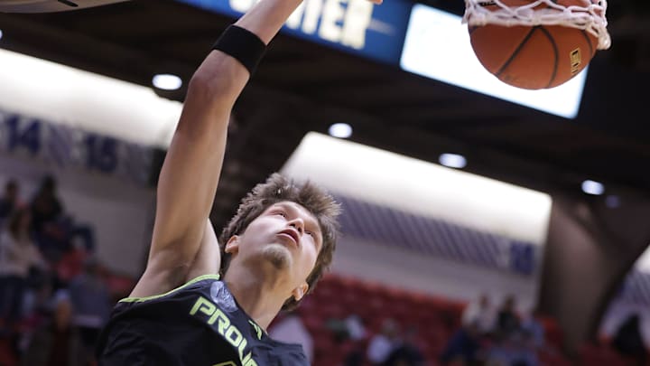 Nikola Bundalo with Prolific Prep dunks in the first half against St. Vincent-St. Mary in the Play by Play Classic held at the Canton Memorial Civic Center Tuesday, Feb. 18, 2025.