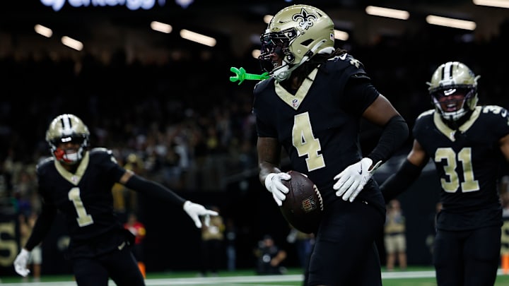 New Orleans Saints cornerbacks Kool-Aid Mckinstry (4), Alontae Taylor (1), and safety Jordan Howden (31) celebrate an interception against the New York Giants on Oct. 5, 2025.