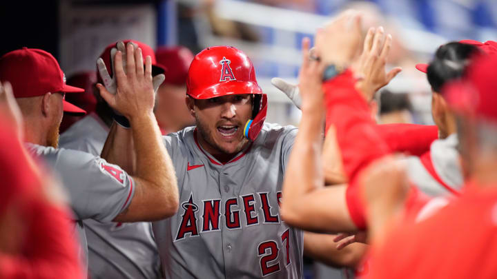 Los Angeles Angels center fielder Mike Trout (27) celebrates with his team after the 2nd home run of the game against the Miami Marlins