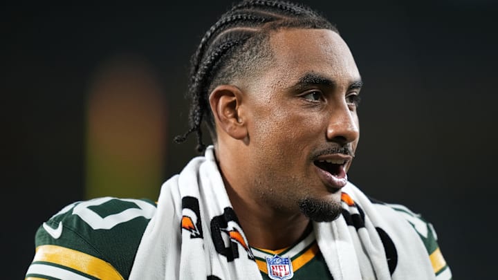 Green Bay Packers quarterback Jordan Love walks off the field after a game against the New York Jets at Lambeau Field. 