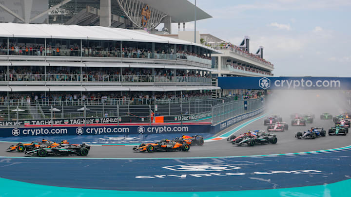 May 3, 2025; Miami Gardens, FL, USA; McLaren driver Oscar Piastri (81) races against Mercedes driver Kimi Antonelli (12) during the F1 Miami Grand Prix Sprint Race at Miami International Autodrome. Mandatory Credit: Sam Navarro-Imagn Images