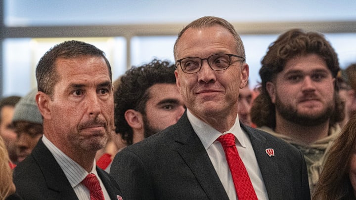 Wisconsin   s new head football coach Luke Fickell, left is shown with athletic director Chris McIntosh at a welcome event November 28, 2022 at Camp Randall Stadium in Madison. He was previously head coach for six seasons at Cincinnati.