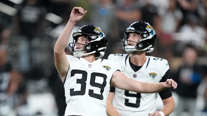 Nov 2, 2025; Paradise, Nevada, USA; Jacksonville Jaguars place kicker Cam Little (39) kicks a field goal out of the hold of punter Logan Cooke (9) against the Las Vegas Raiders in the second half at Allegiant Stadium. Mandatory Credit: Kirby Lee-Imagn Images