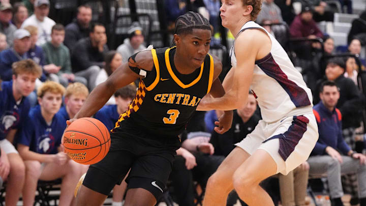 West Allis Central's Yusef Gray Jr., left, breaks past Brookfield East's Zeke Sawall (3) during the game at Brookfield East High School, in Brookfield, Wisconsin, Jan. 22, 2026. West Allis Central's Yusef Gray Jr., left, breaks past Brookfield East's Zeke Sawall (3) during the game at Brookfield East High School, in Brookfield, Wisconsin, Jan. 22, 2026.