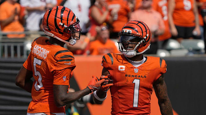 Cincinnati Bengals wide receivers Tee Higgins (5) and Ja'Marr Chase (1) celebrate Higgins’ touchdown in the 2nd half over Jacksonville Jaguars at Paycor Stadium on Sunday, September 14, 2025. The Bengals won 27-31. Cincinnati Bengals wide receivers Tee Higgins (5) and Ja'Marr Chase (1) celebrate Higgins’ touchdown in the 2nd half over Jacksonville Jaguars at Paycor Stadium on Sunday, September 14, 2025. The Bengals won 27-31.