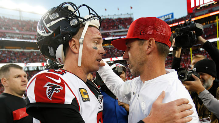 Atlanta Falcons quarterback Matt Ryan (L) greets San Francisco 49ers head coach Kyle Shanahan (R)