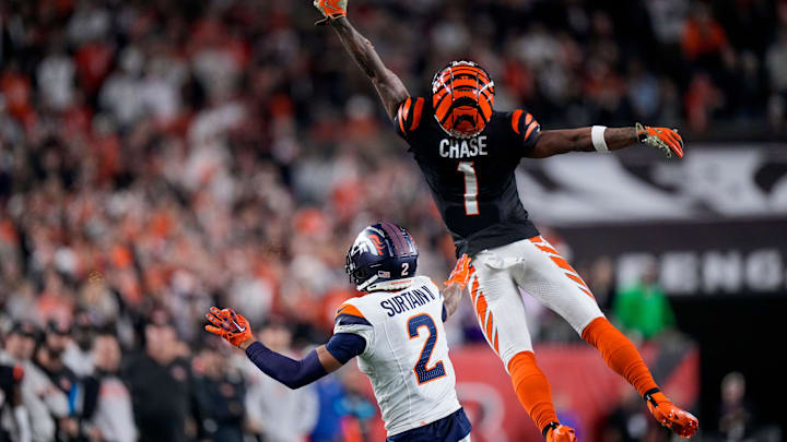 Cincinnati Bengals wide receiver Ja'Marr Chase (1) is unable to get to a pass attempt in overtime of the NFL Week 17 game between the Cincinnati Bengals and the Denver Broncos at Paycor Stadium in downtown Cincinnati on Saturday, Dec. 28, 2024. The Bengals took a 30-24 win in overtime to remain in the post season chase.