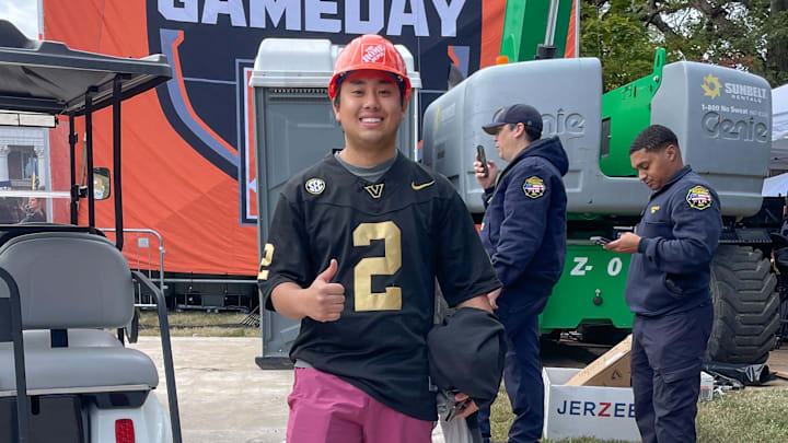 Sophomore Tyler Hwang, 19, warms up backstage to kick at ESPN’s College Gameday at Vanderbilt's Wyatt Lawn in Nashville, Tenn., Saturday, Oct. 25, 2025. Sophomore Tyler Hwang, 19, warms up backstage to kick at ESPN’s College Gameday at Vanderbilt's Wyatt Lawn in Nashville, Tenn., Saturday, Oct. 25, 2025.