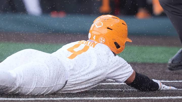 Tennessee's Manny Marin (4) slides over home plate during the NCAA college baseball game against in Knoxville, Tennessee on May 8, 2026.