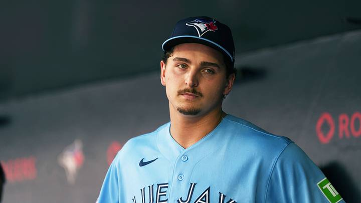 Aug 15, 2026; Toronto, Ontario, CAN; Toronto Blue Jays relief pitcher Ricky Tiedemann (33) stands in the dugout against the New York Yankees during the third inning at Rogers Centre. Mandatory Credit: Nick Turchiaro-Imagn Images