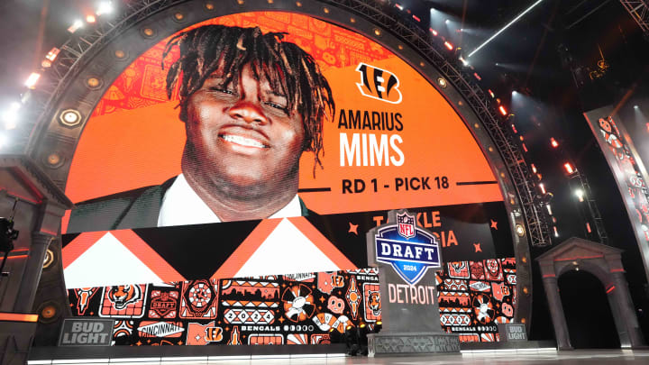 Apr 25, 2024; Detroit, MI, USA; Georgia Bulldogs tackle Amarius Mims is selected as the No. 18 pick of the first round by the Cincinnati Bengals during the 2024 NFL Draft at Campus Martius Park and Hart Plaza. Mandatory Credit: Kirby Lee-USA TODAY Sports Apr 25, 2024; Detroit, MI, USA; Georgia Bulldogs tackle Amarius Mims is selected as the No. 18 pick of the first round by the Cincinnati Bengals during the 2024 NFL Draft at Campus Martius Park and Hart Plaza. Mandatory Credit: Kirby Lee-USA TODAY Sports
