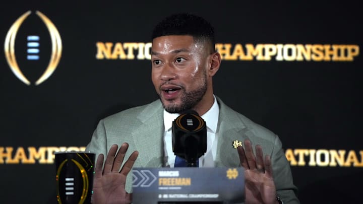 Freeman speaks during a press conference. 