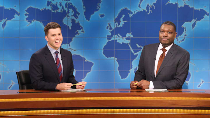 SATURDAY NIGHT LIVE -- Episode 1864 -- Pictured: (l-r) Anchor Colin Jost and anchor Michael Che during Weekend Update on Saturday, May 18, 2024 -- (Photo by: Will Heath/NBC)