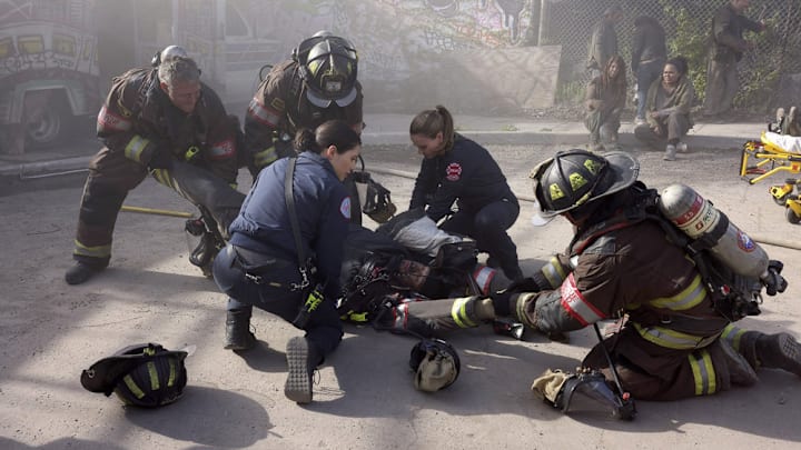 CHICAGO FIRE -- "Under Pressure" Episode 12012 -- Pictured: (l-r) Taylor Kinney as Kelly Severide, Hanako Greensmith as Violet Mikami, Jocelyn Hudon as Novak, Joe Minoso as Joe Cruz -- (Photo by: Adrian S Burrows Sr/NBC)