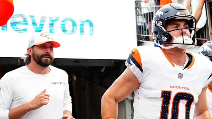 Aug 18, 2024; Denver, Colorado, USA; Denver Broncos quarterback Bo Nix (10) and quarterback Jarrett Stidham (8) before the preseason game against the Green Bay Packers at Empower Field at Mile High. Aug 18, 2024; Denver, Colorado, USA; Denver Broncos quarterback Bo Nix (10) and quarterback Jarrett Stidham (8) before the preseason game against the Green Bay Packers at Empower Field at Mile High.