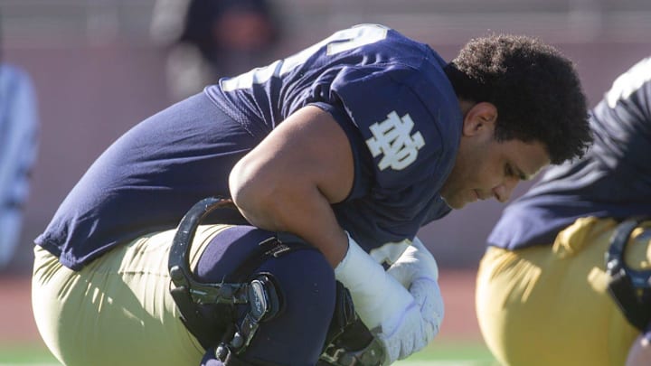 Notre Dames Charles Jagusah stretches during practice at the SAC on Dec. 26, 2023, as they prepare for the Tony the Tiger Sun Bowl against Oregon State.