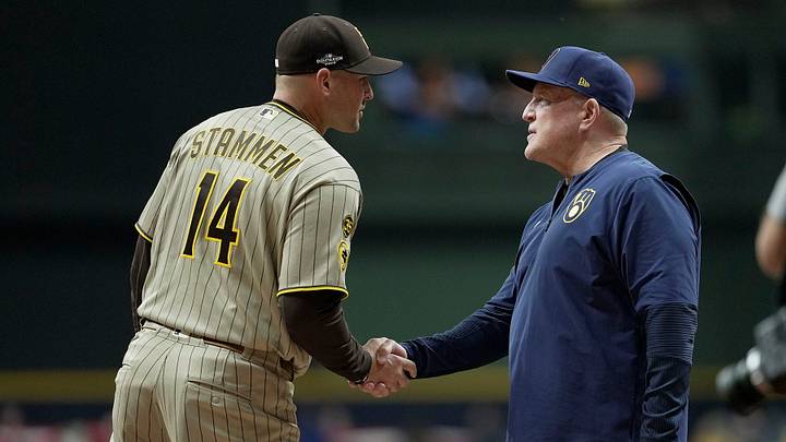 San Diego Padres manager Craig Stammen shakes hands with Milwaukee Brewers manager Pat Murphy before their National League Division Series game at American Family Field on Oct 3, 2026.