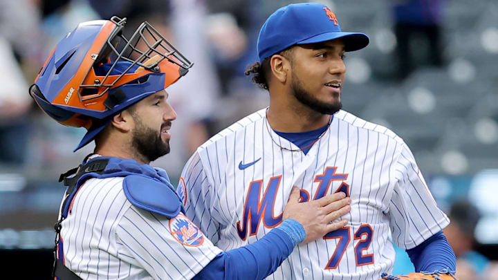 New York Mets catcher Tomas Nido (3) and relief pitcher Denyi Reyes
