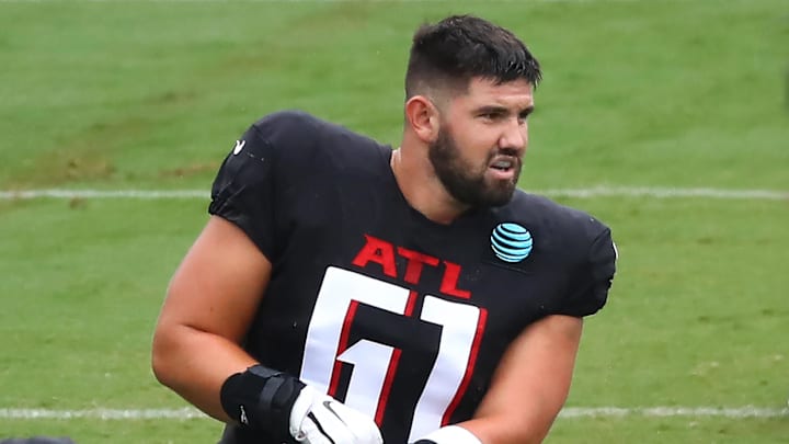 Aug 24, 2020; Flowery Branch, GA, USA;  Atlanta Falcons rookie center Matt Hennessy loosens up for