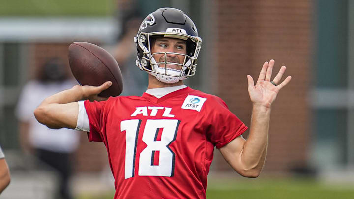 Jul 24, 2025; Flowery Branch, GA, USA; Atlanta Falcons quarterback Kirk Cousins (18)  passes during training camp at IBM Performance Field. Mandatory Credit: Dale Zanine-Imagn Images