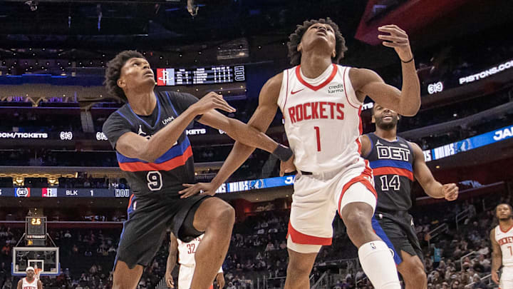 Jan 12, 2024; Detroit, Michigan, USA; Detroit Pistons forward Ausar Thompson (9) battles for for the rebound with Amen Thompson