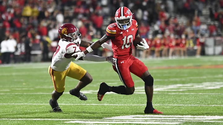 Oct 19, 2024; College Park, Maryland, USA; Maryland Terrapins wide receiver Tai Felton (10) runs by Southern California Trojans safety Kamari Ramsey (7) during the second half at SECU Stadium. Oct 19, 2024; College Park, Maryland, USA; Maryland Terrapins wide receiver Tai Felton (10) runs by Southern California Trojans safety Kamari Ramsey (7) during the second half at SECU Stadium.