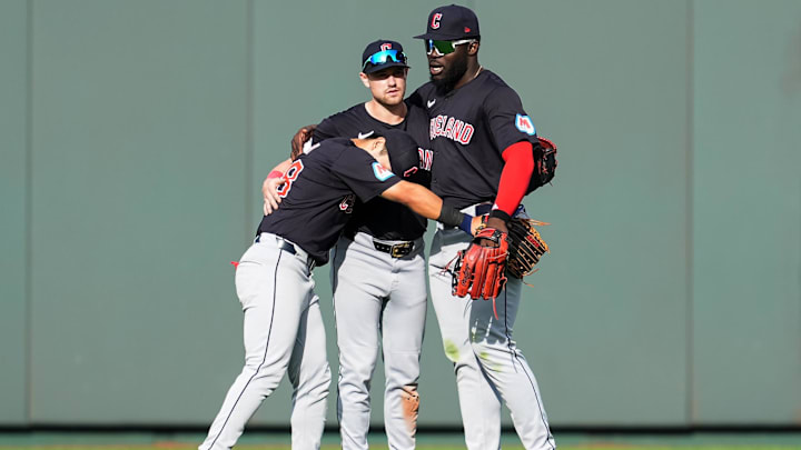 Sep 2, 2024; Kansas City, Missouri, USA; Cleveland Guardians left fielder Steven Kwan (38) and center fielder Lane Thomas (8) and right fielder Jhonkensy Noel (43) celebrate after defeating the Kansas City Royals at Kauffman Stadium. Mandatory Credit: Jay Biggerstaff-Imagn Images Sep 2, 2024; Kansas City, Missouri, USA; Cleveland Guardians left fielder Steven Kwan (38) and center fielder Lane Thomas (8) and right fielder Jhonkensy Noel (43) celebrate after defeating the Kansas City Royals at Kauffman Stadium. Mandatory Credit: Jay Biggerstaff-Imagn Images